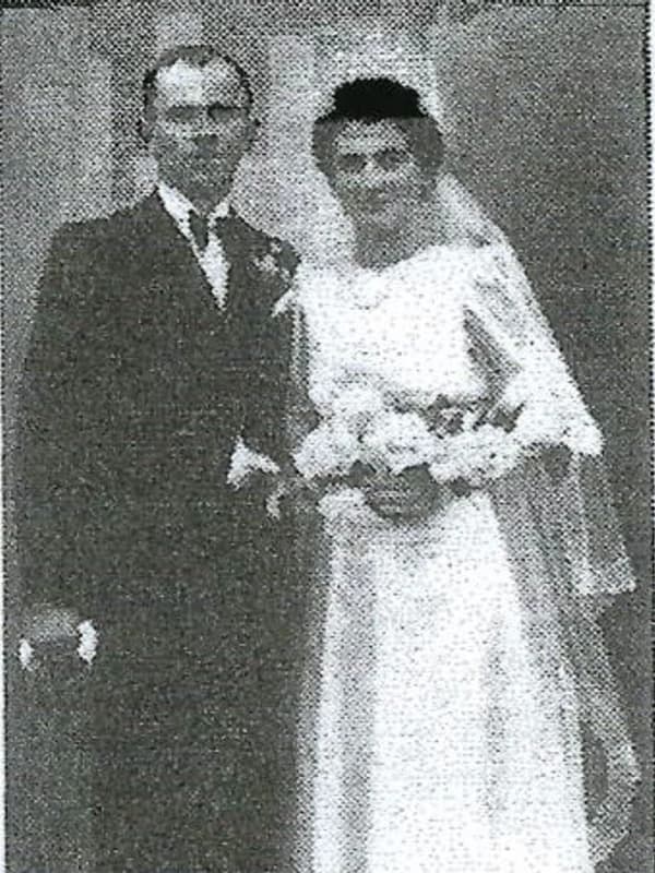 Original blurry black and white wedding photo before AI restoration